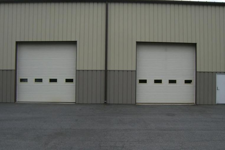 Two Ribbed Steel Model 3285 doors in white.